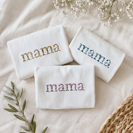 zloženi puloverji mama z vezenjem v treh vzorčnih barvah (jesen, zima, pomlad)